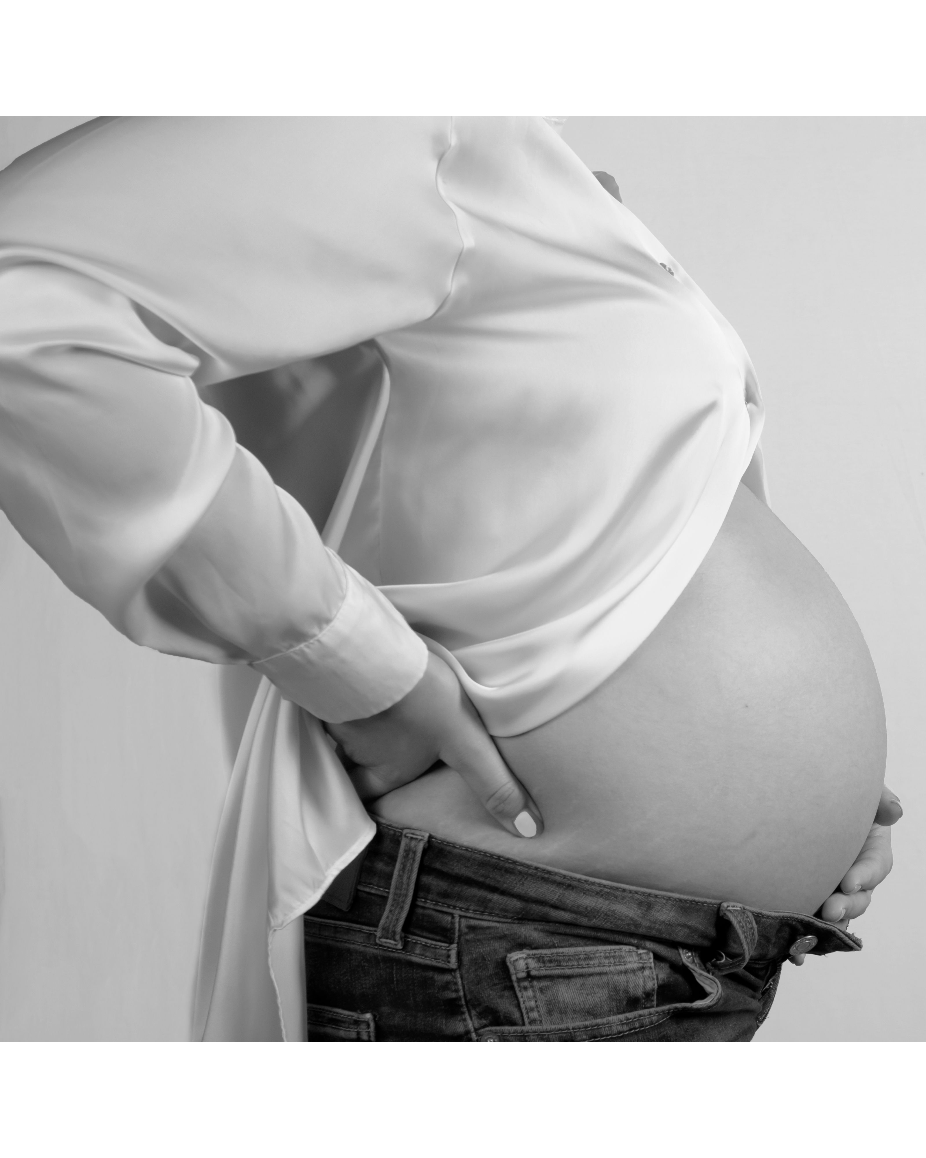 Back Pain in Early Pregnancy: Is it Normal? Causes, Relief & Warning Signs